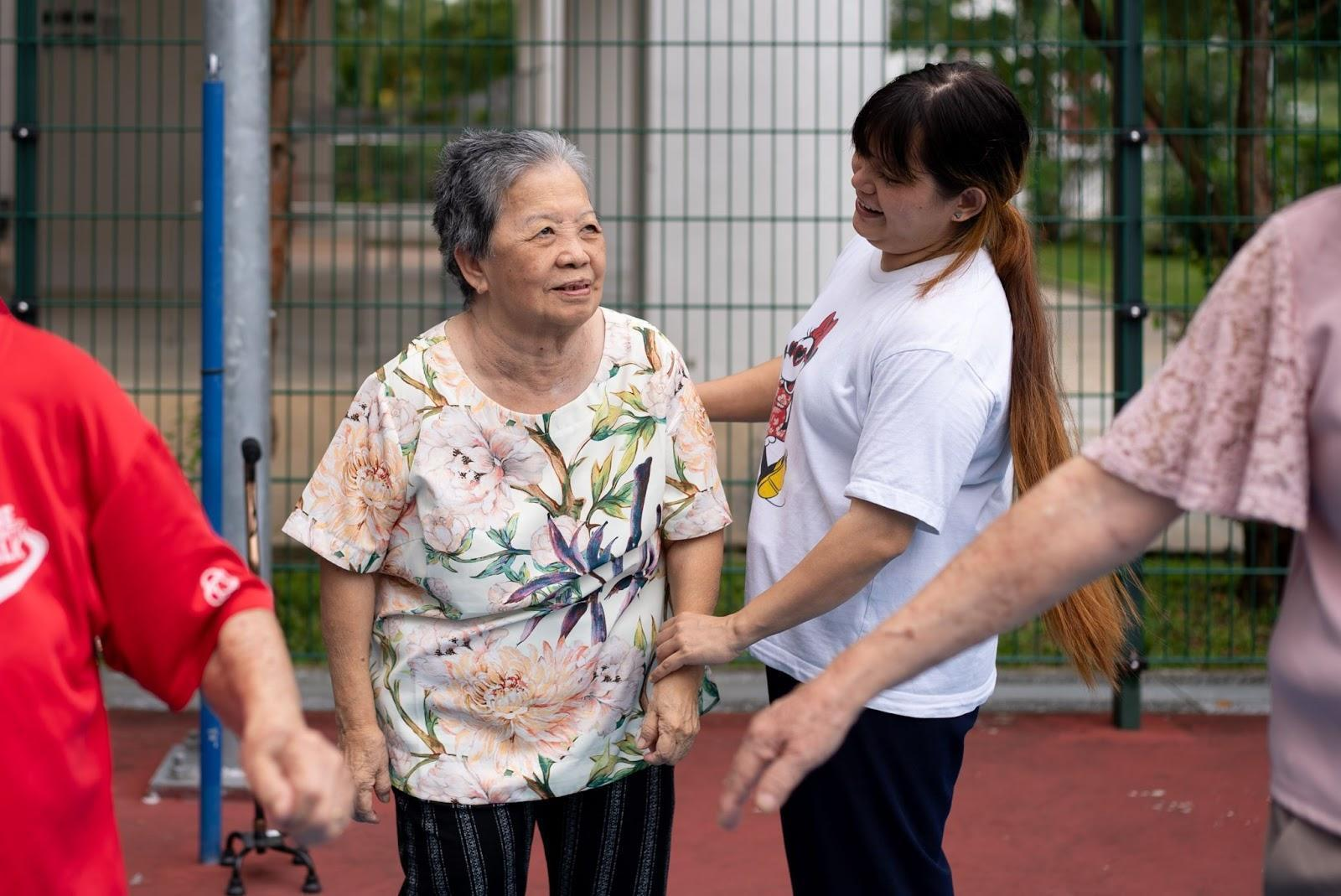 Auntie Chue with RCSL employee