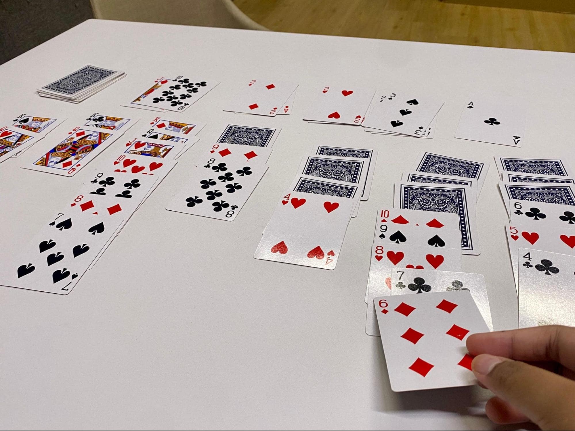 Card and board games - a mid-game round of Solitaire
