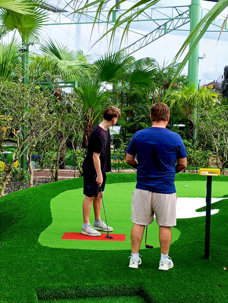 lining up a golf putt 