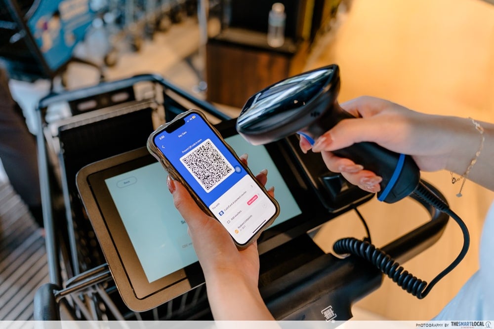 Scanning QR code to use the Smart Cart