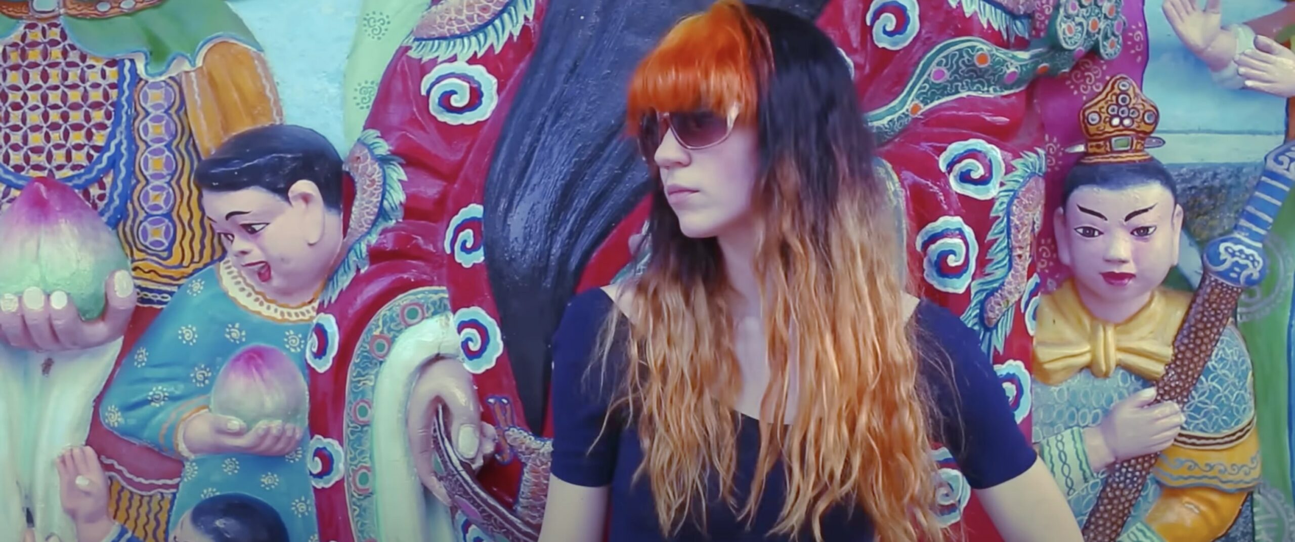 Grimes' music video filmed in Haw Par Villa, Singapore