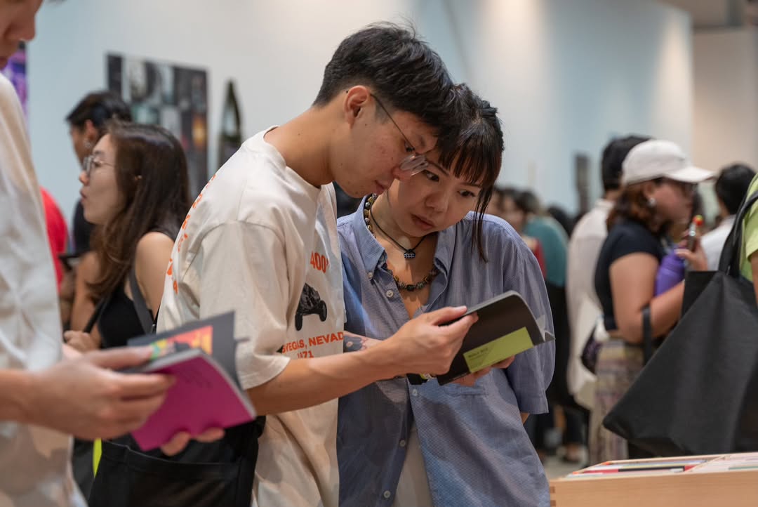 people browsing books at Singapore Art Book Fair