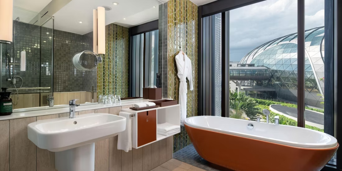 Standard King Jewel Wing bathroom at Crowne Plaza Changi Airport
