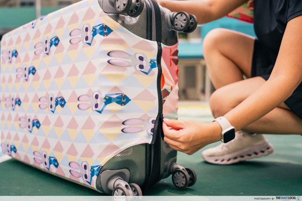 Get Disney’s Zootopia 2 merchandise at OCBC - luggage cover