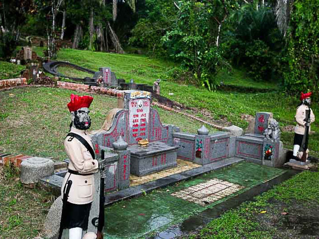 Tomb with Sikh Guard statues at Bukit Brown Cemetery, a popular ghost hunting spot