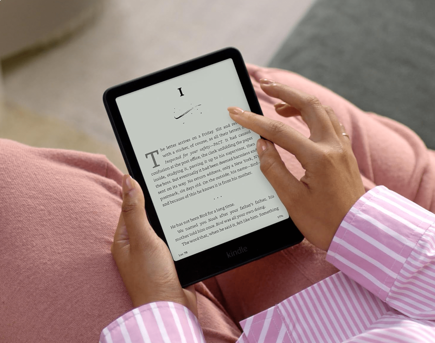 lady reading a Kindle e-reader