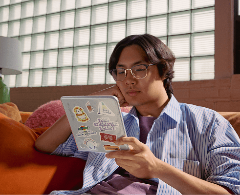 guy reading on Kobo e-reader