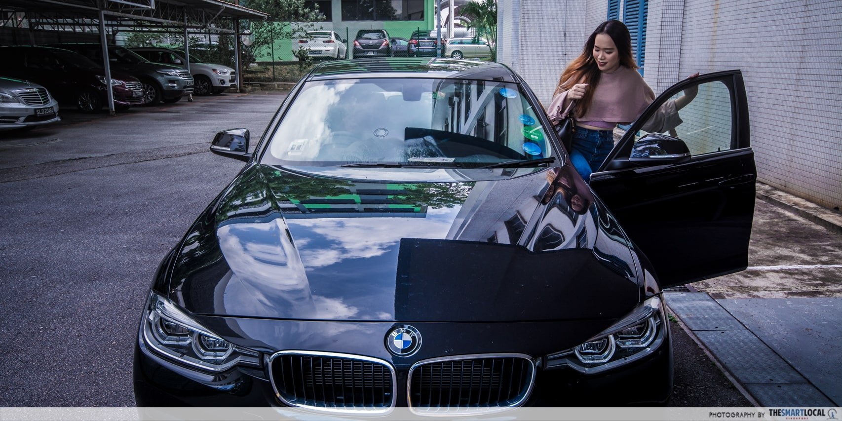 Person getting into car