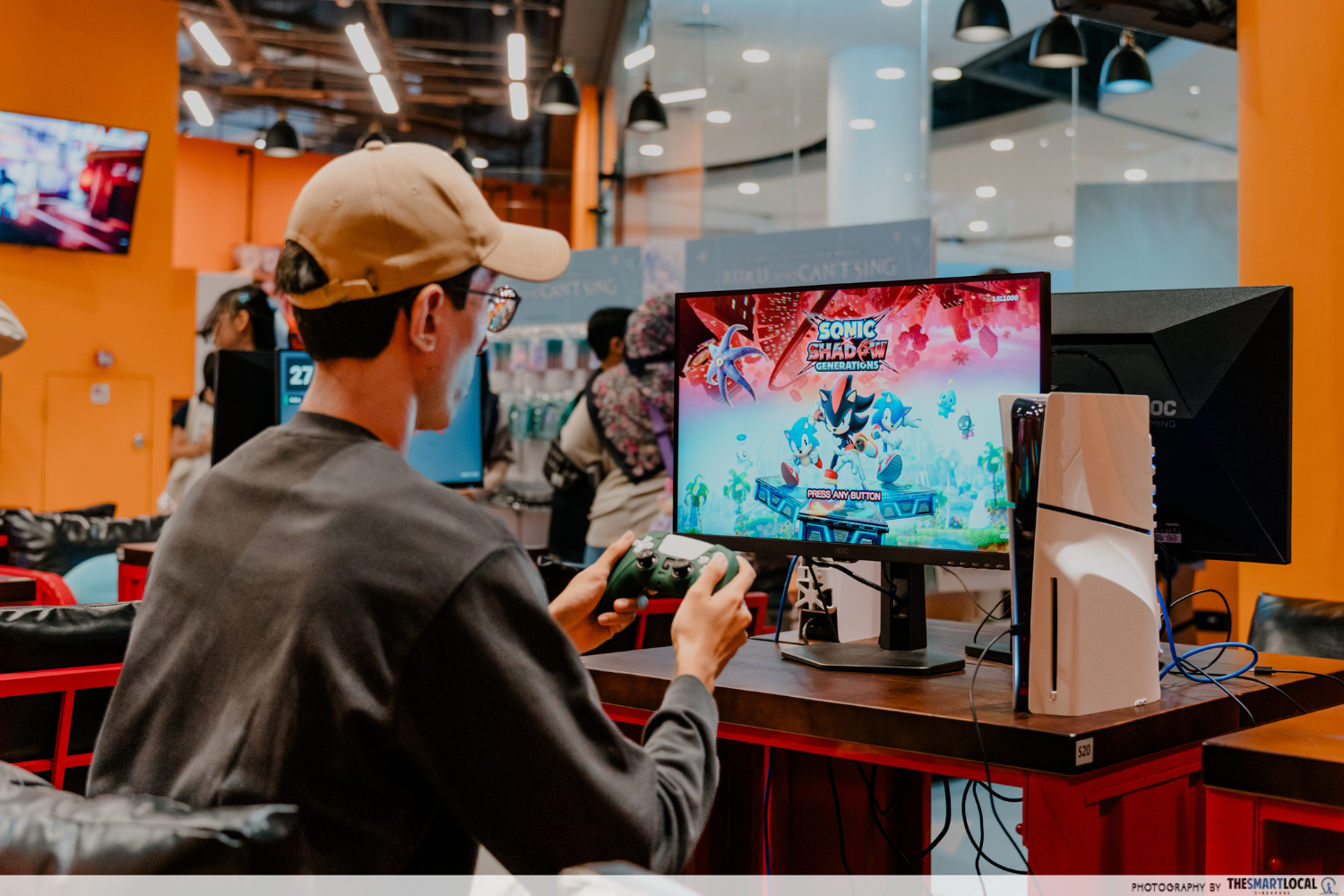 Guy playing PlayStation Games