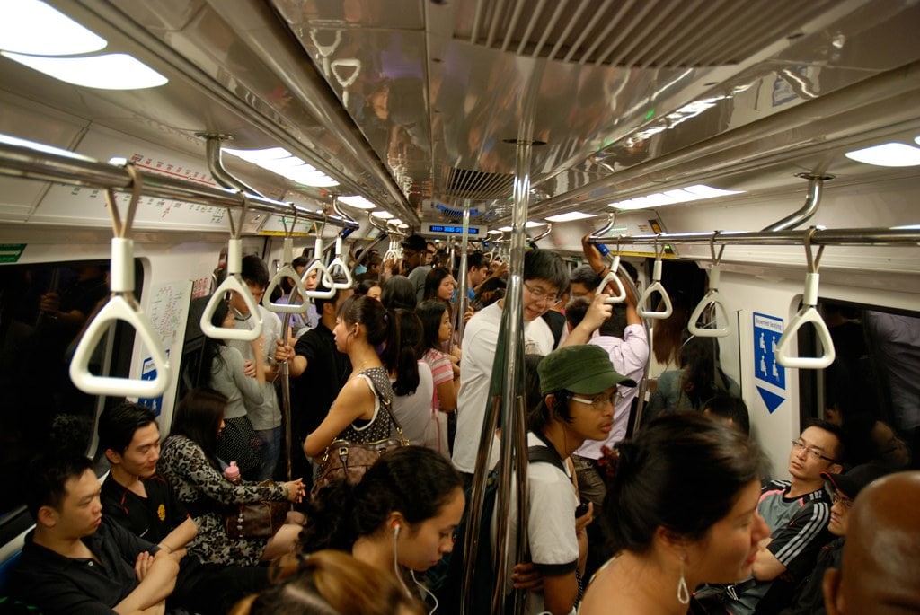 crowded MRT in Singapore