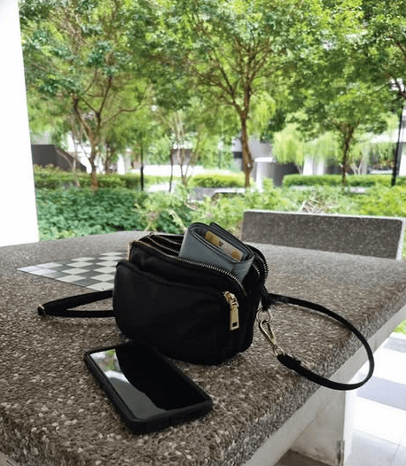 phone, tablet, and handbag left unattended.