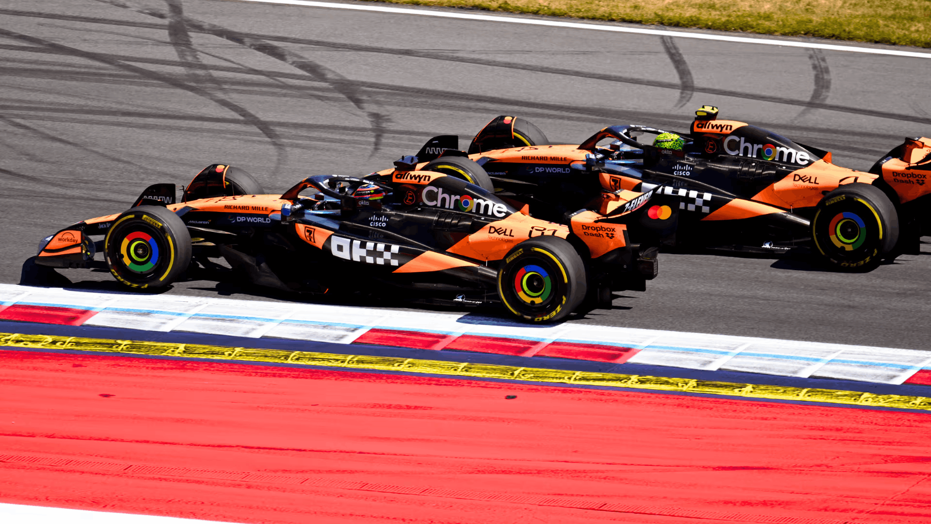 McLaren drivers Lando Norris and Oscar Piastri battling on track