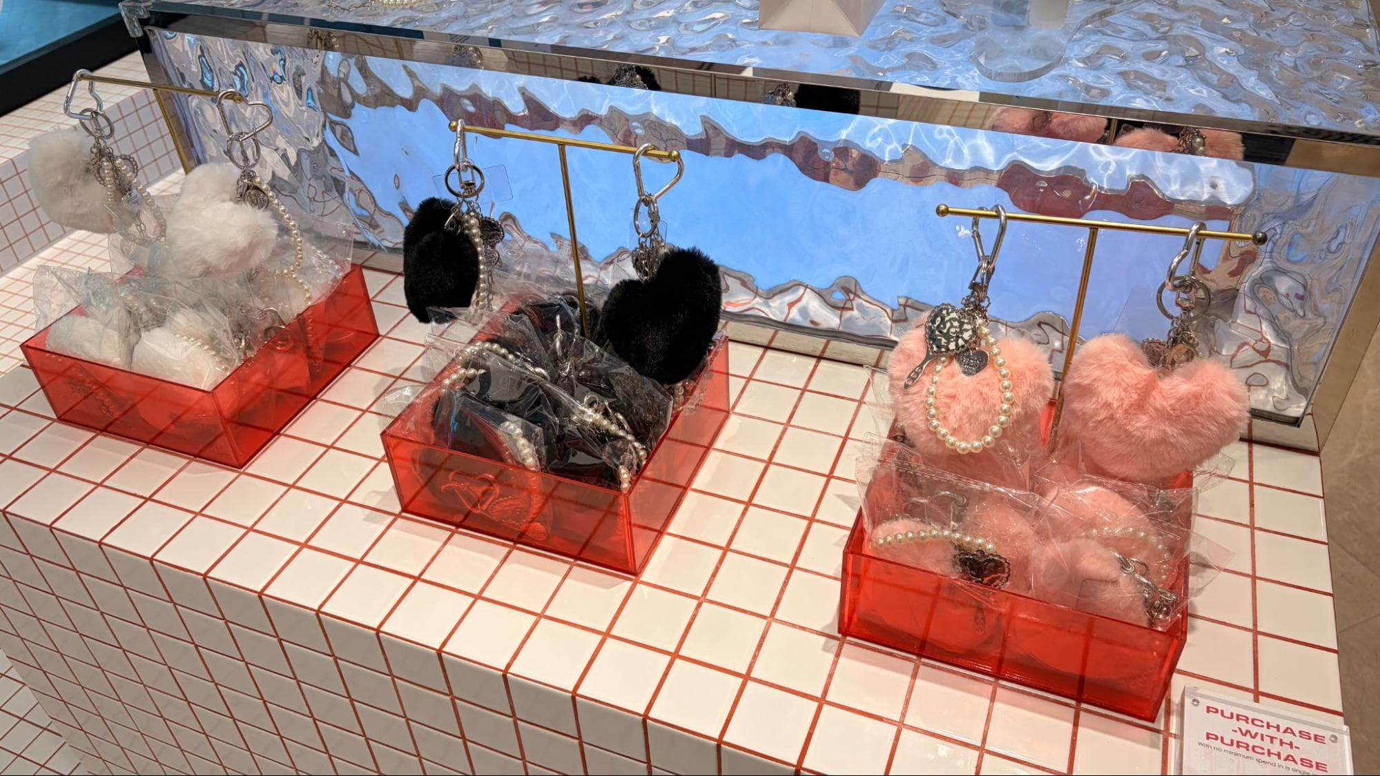 minimuse metro paragon in orchard - store display selling mini beauty and fragrance products with vouchers +free pouch and keychain