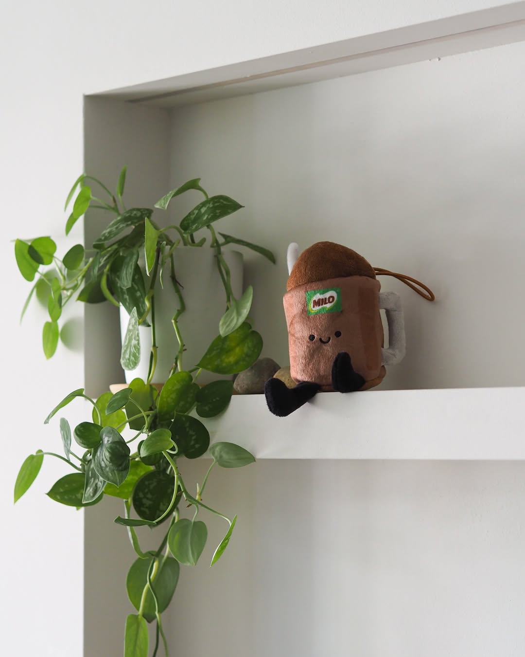 MILO dinosaur plushie