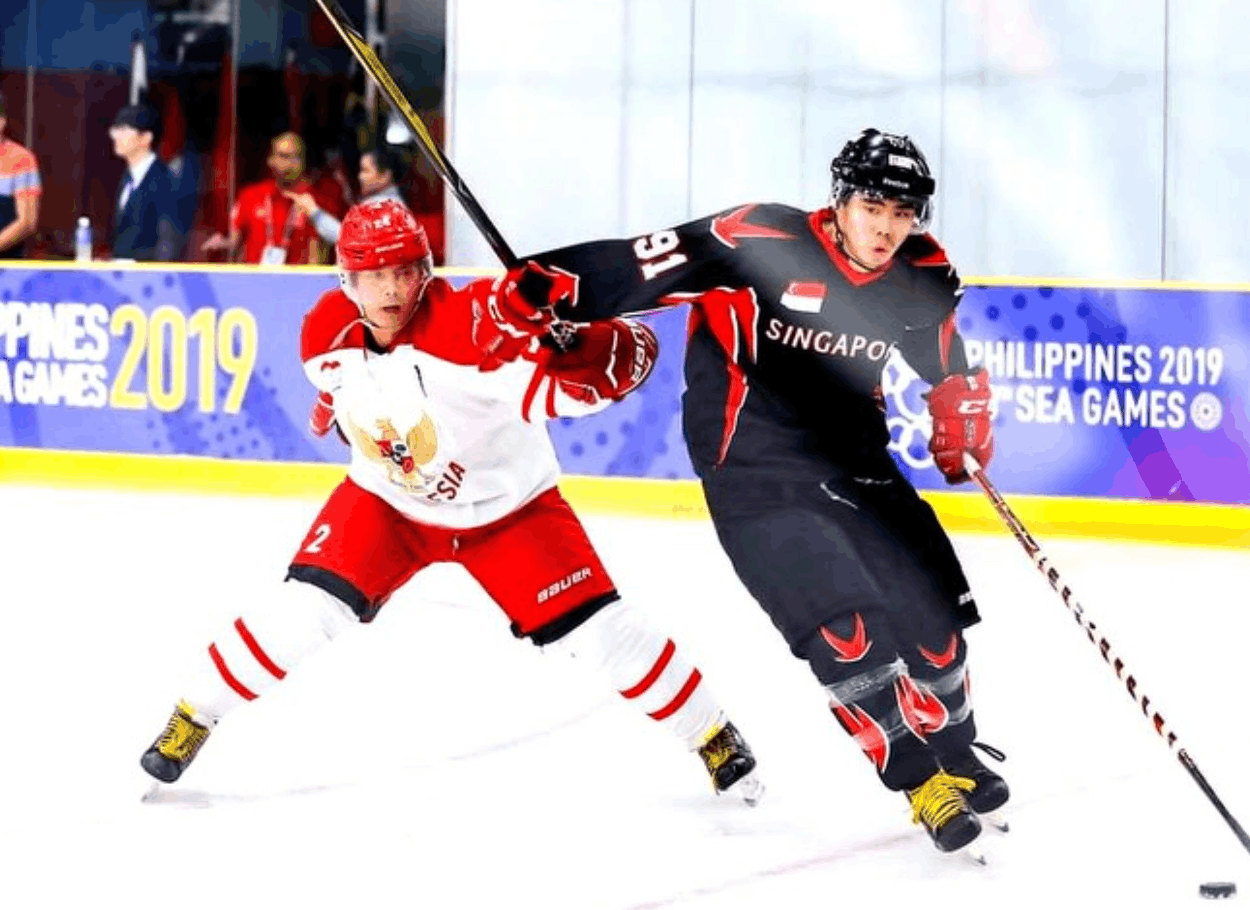ice penguin ice skating rink clarke quay central coach iggi SEA medalist TeamSG ice hockey player