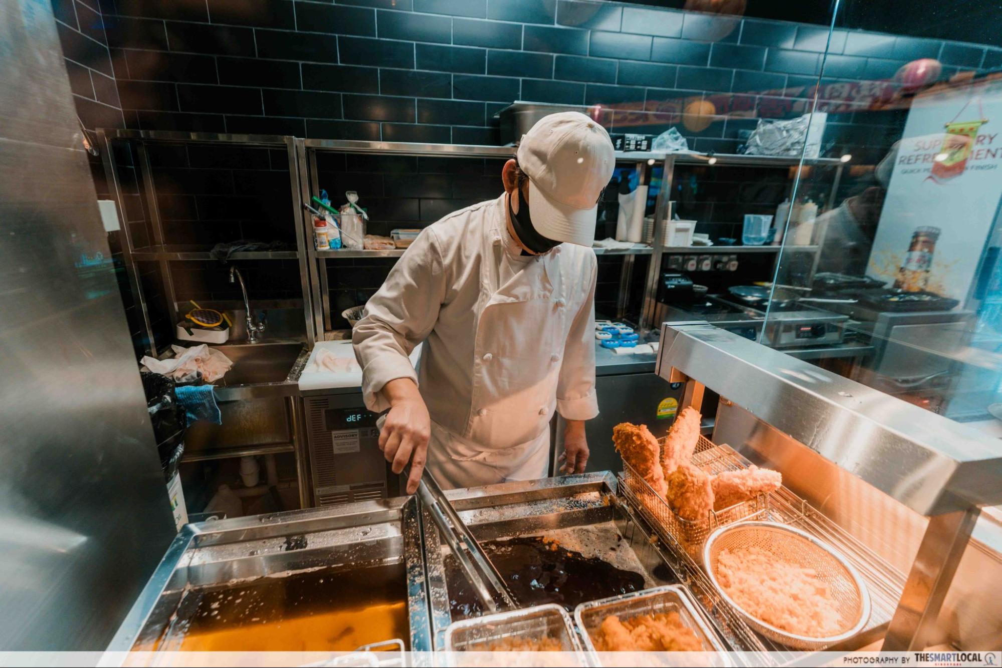 Chef cooking at Tonkatsu Daiki