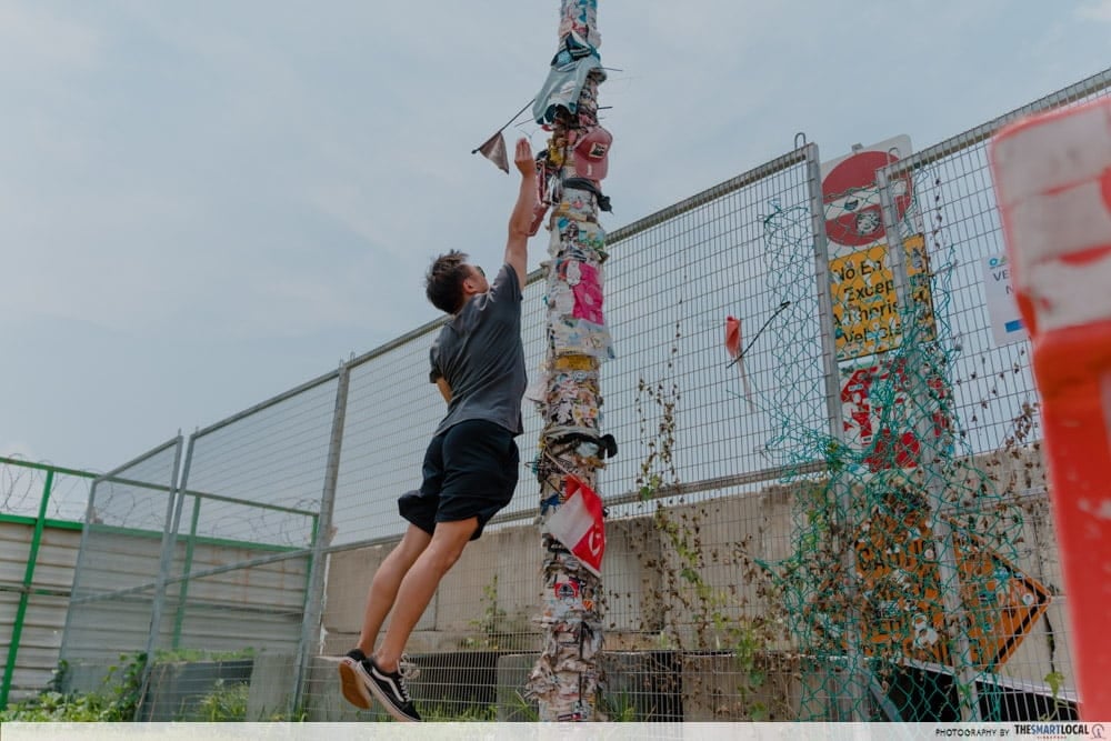 jumping at tuas lamp post 1