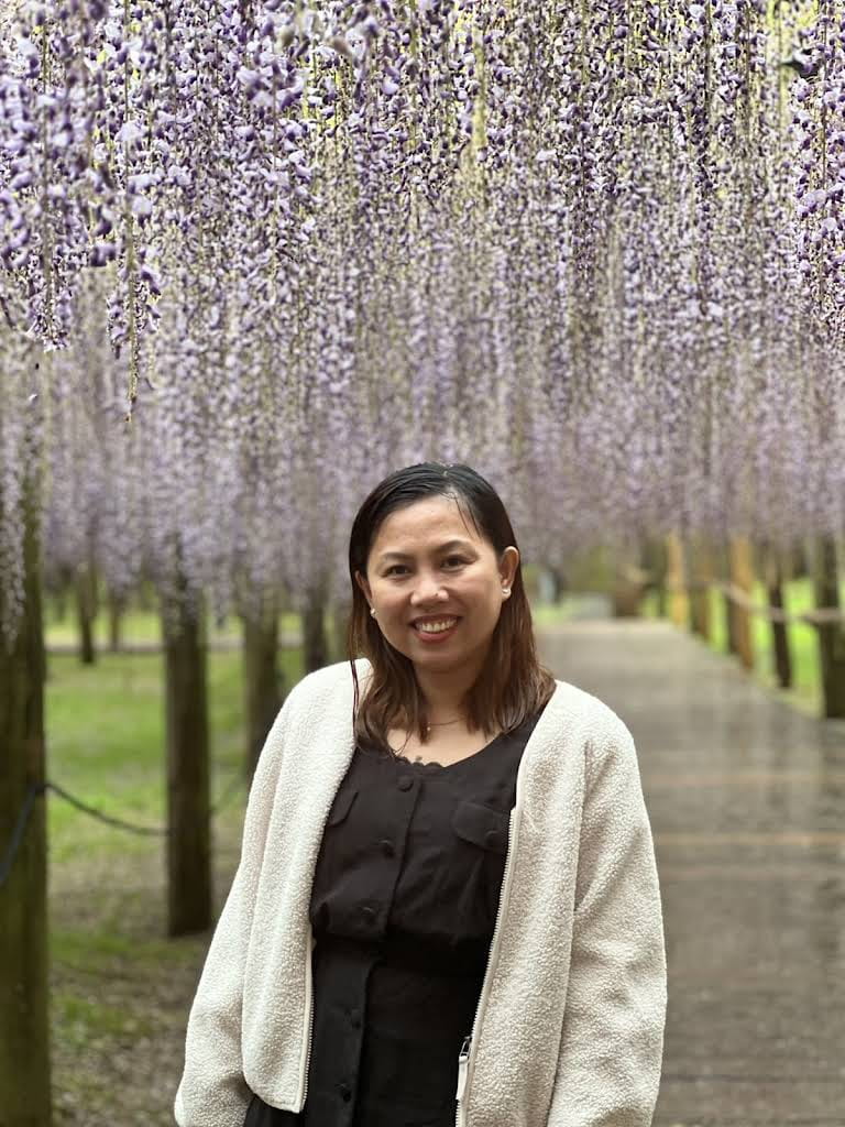 in the wisteria tunnel