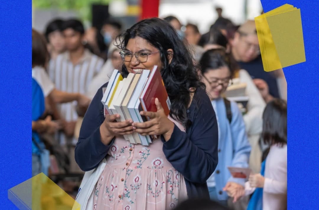 Walking away with books from the Big Book Giveaway