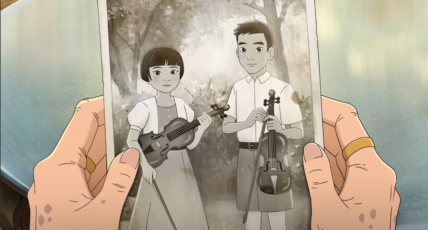 The Violinist movie still showing a photograph