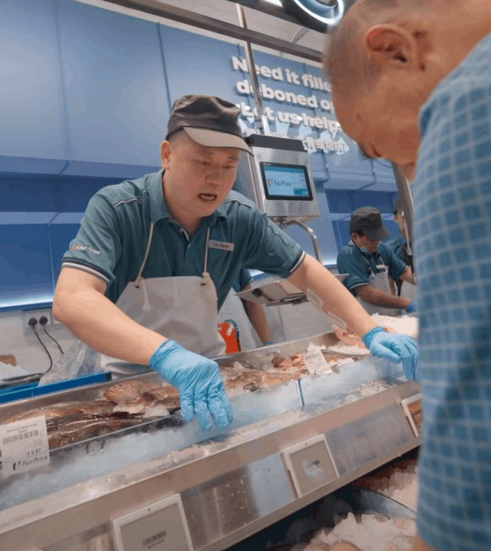 Staff at the seafood counter