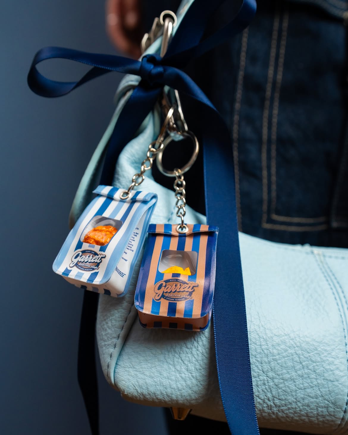 Micro Bag attached to a handbag
