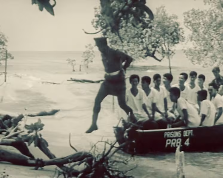 Inmates getting off boat